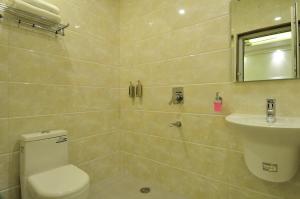 Koupelna v ubytování Hotel Yuvraj Deluxe