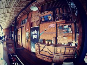 a room with a brick wall with a counter in it at Cafe del sunshine in Ko Chang