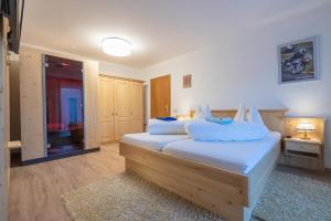 Letto o letti in una camera di Hotel Beim Winkler