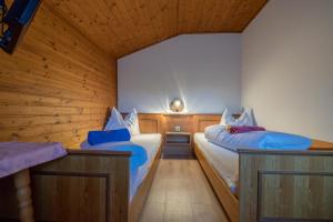 Letto o letti in una camera di Hotel Beim Winkler