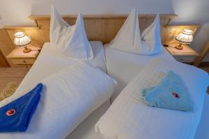 Letto o letti in una camera di Hotel Beim Winkler