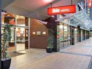 a store with a sign on the front of it at ibis Wellington in Wellington