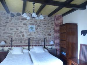 Cama o camas de una habitación en Rural Montesa