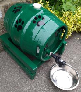 a green dog dryer sitting on the ground at The Tree House in Durham