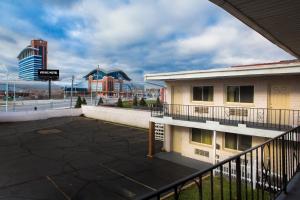 a parking lot in front of a building at Viking Motel-Detroit in Detroit