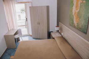Postel nebo postele na pokoji v ubytování Hotel Piccolo Sogno