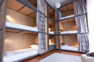 a room with four bunk beds in it at Franca City Hostel in Buenos Aires