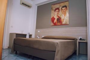 Postel nebo postele na pokoji v ubytování Hotel Piccolo Sogno