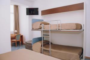 Postel nebo postele na pokoji v ubytování Hotel Piccolo Sogno + 37 fotografií