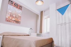 Postel nebo postele na pokoji v ubytování Hotel Piccolo Sogno