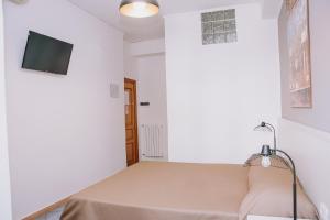 Postel nebo postele na pokoji v ubytování Hotel Piccolo Sogno