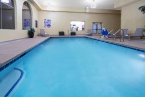 a large swimming pool in a hotel room at Baymont by Wyndham Las Vegas South Strip in Las Vegas