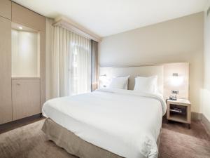 Postel nebo postele na pokoji v ubytování Hôtel Le Pré Carré + 30 fotografií