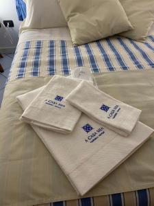 A bed or beds in a room at a casa mia holiday rental