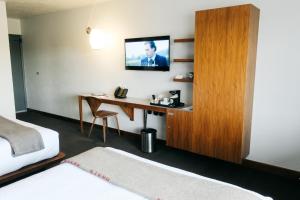 Postel nebo postele na pokoji v ubytování Modern Hotel