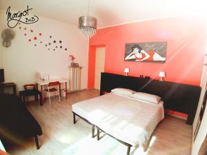 Postel nebo postele na pokoji v ubytování B&B Margot
