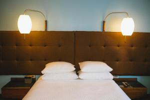 Postel nebo postele na pokoji v ubytování Modern Hotel