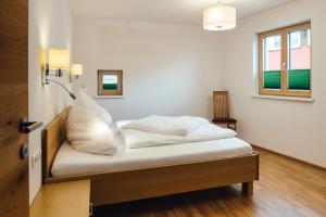 Łóżko lub łóżka w pokoju w obiekcie Nowders Apartments