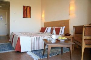 Ein Bett oder Betten in einem Zimmer der Unterkunft Sufetula Hotel