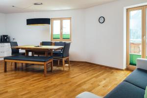 Telewizja i/lub zestaw kina domowego w obiekcie Nowders Apartments