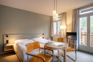 Postel nebo postele na pokoji v ubytování Hotel Alpenruhe - Vintage Design Hotel