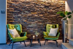 Posezení v ubytování Hotel das Zwölferhaus