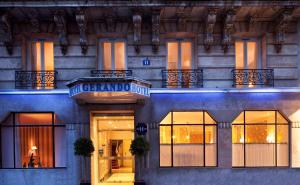 a building with a sign that reads grandad hotel at Hôtel Gérando in Paris