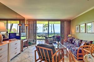 a living room with a couch and a table at Beachside Kihei Vacation Rental with Stunning Views! in Kihei