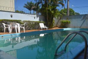 Hotel Obino São Borja tesisinde veya buraya yakın yüzme havuzu