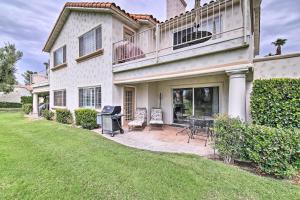 a house with a patio and a grill at Palm Desert Country Club Home with Patio and Grill! in Palm Desert