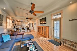 a living room with a couch and a ceiling fan at Downtown Salida Home, 1 Block to Main Street, 0547 in Salida