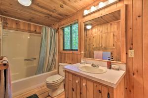 a bathroom with a sink and a toilet and a shower at Cabin with 3 Acres, Tennis Courts By 4 Ski Mtns in Sandisfield +22 photos