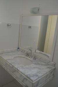 Postel nebo postele na pokoji v ubytování Hotel Obino São Borja