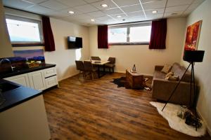 A television and/or entertainment centre at Chalet West