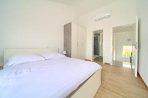 Postel nebo postele na pokoji v ubytování Adria House