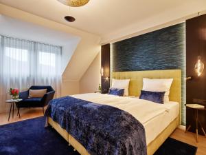 Postel nebo postele na pokoji v ubytování Hotel Erasmus - Mein Genuss- und Wellnesshotel