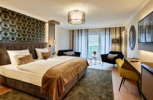 Postel nebo postele na pokoji v ubytování Hotel Erasmus - Mein Genuss- und Wellnesshotel