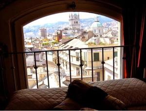 A bed or beds in a room at Torre Ducale Dimora Storica