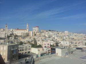 a view of a city with buildings at Holy Family Hotel in Bethlehem