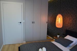 Posteľ alebo postele v izbe v ubytovaní Last Floor Apartment - Krakow City Center close to Old Town