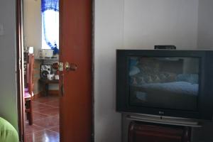 Μια τηλεόραση ή/και κέντρο ψυχαγωγίας στο Casa de Campo con hermosa vista a Los Farallones