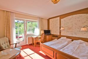 Ένα ή περισσότερα κρεβάτια σε δωμάτιο στο Hotel Hanses-Bräutigam