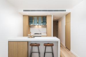 Kuhinja oz. manjša kuhinja v nastanitvi Collins House Apartments by CLLIX