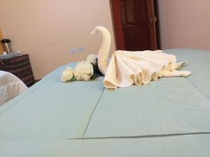 Hostal Real Divina客房内的一张或多张床位