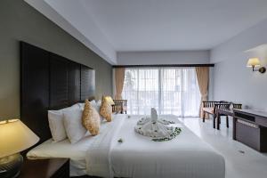Postel nebo postele na pokoji v ubytování Samaya Wellness Resort