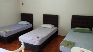 Ένα ή περισσότερα κρεβάτια σε δωμάτιο στο Hotel Avenida - Hotel do Morais - Salto do Lontra