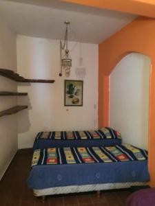 Ένα ή περισσότερα κρεβάτια σε δωμάτιο στο Gimenoz Apart