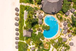 an overhead view of a swimming pool in a resort at Zanzibar Queen Hotel in Matemwe