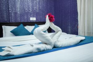 Katil atau katil-katil dalam bilik di Hotel Green Horizon
