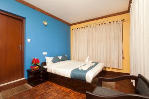 Katil atau katil-katil dalam bilik di Hotel Green Horizon